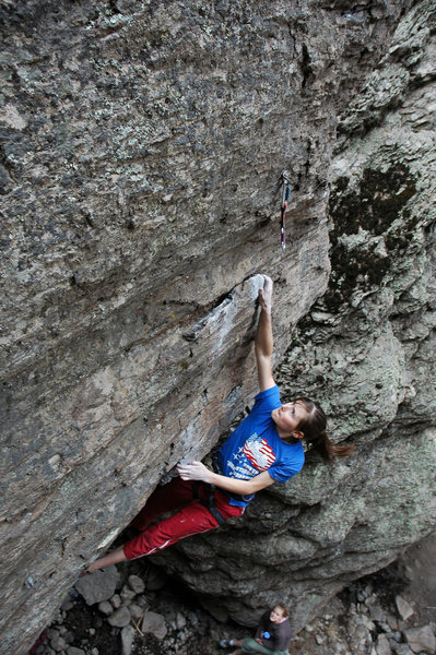 Fun big moves on jugs turn the lip of the overhang before the technical arete.