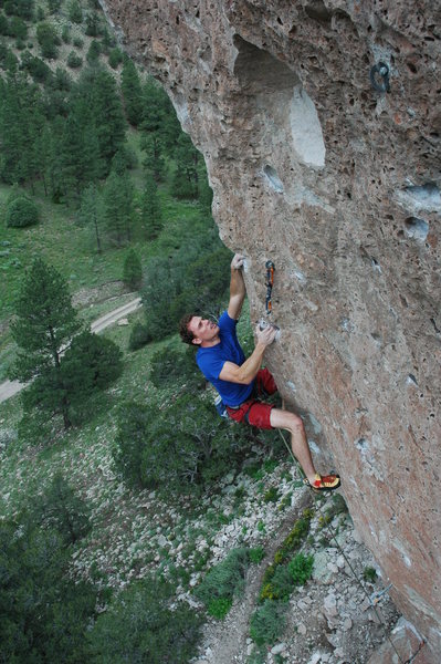 Matthew NM on the jugs just past the lower crux of the route