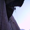 Doug climbs through the roofs on Pitch 11.