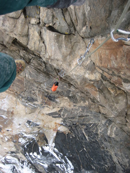 looking down the long overhanging section of Macho Borracho, belay ramp is visible at the bottom-left