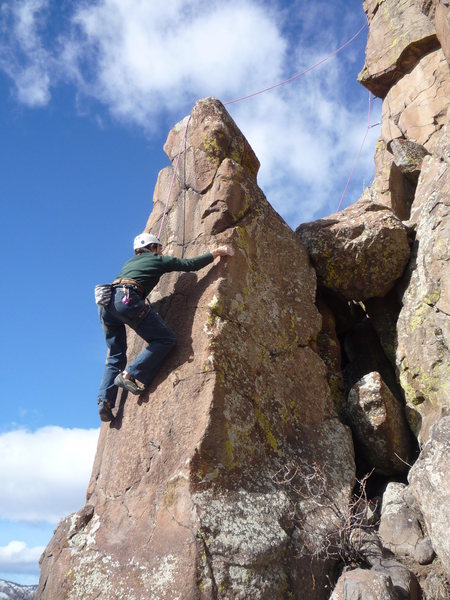 Taking a top rope lap. Notice, the notch for the rope.<br>
Glen C. climbing.
