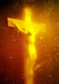 Piss on Christ. No really, this is a crucifix, submerged in piss. A con traversal piece of art from the 80's. Bring back the Video. 