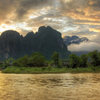Sunset over the west side of Vang Vieng with the Pha Deang Mountains looming in the background [HDR Composite]