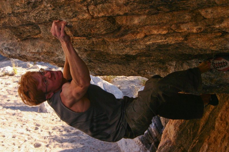 ian about to commit to the crux deadpoint