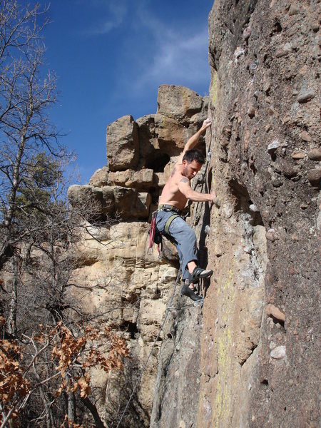 Looking for good feet before the crux.