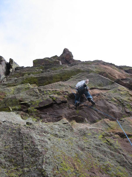 Kevin Murphy preparing to grapple with the crux.