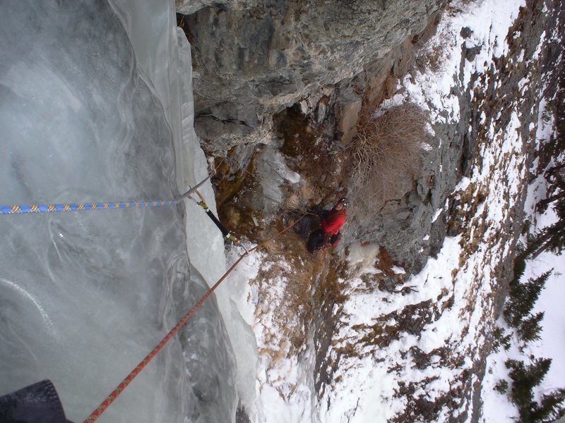 Looking back at my belayer on the 2nd pitch, upward traverse section. Glassy ice. Awesome.