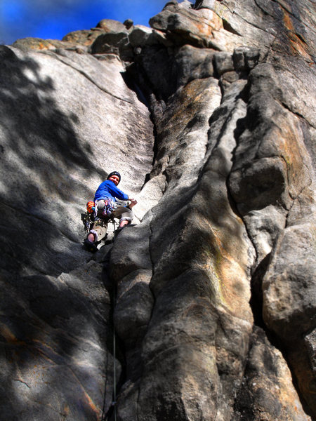 Stan loving the cold January friction... and the icy fingers on "Curving Crack." One of the many great "Castle Rock" sandbag classics. Boulder Canyon, Co. <br>
<br>
I think Stan really likes it....