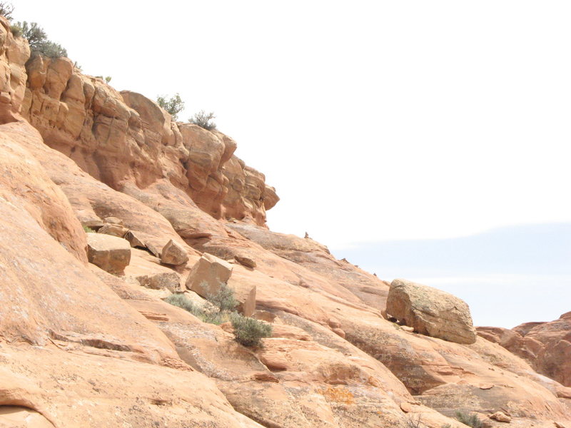 Getting close to the summit from the slabs. The cairn marking the weakness in the cliffs is straight ahead.