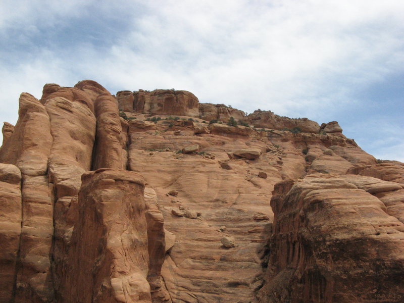This is looking towards the summit from above the first rappel. The slabs are what you must scramble up to reach the summit.
