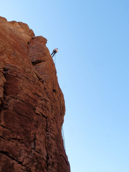 Geir rapping from the newly installed rappel anchor on Entrance Tower.