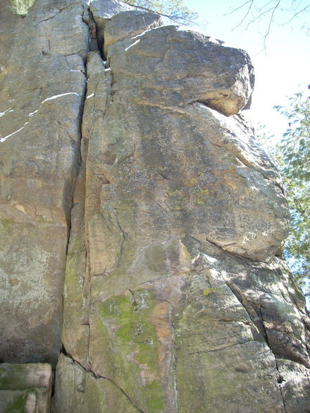 Face to the right of the crack.