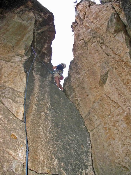Moving onto the arete after the lower crux crack.