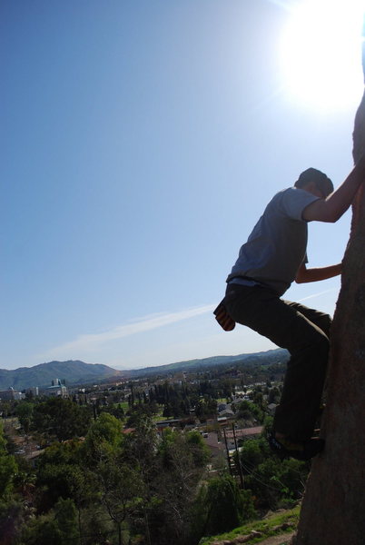 Bill climbing on an unknown boulder problem soemwhere up on Rubidoux