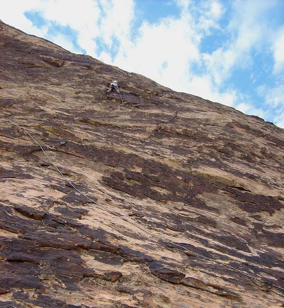 High on the first pitch of Summerset, approaching the belay spot.