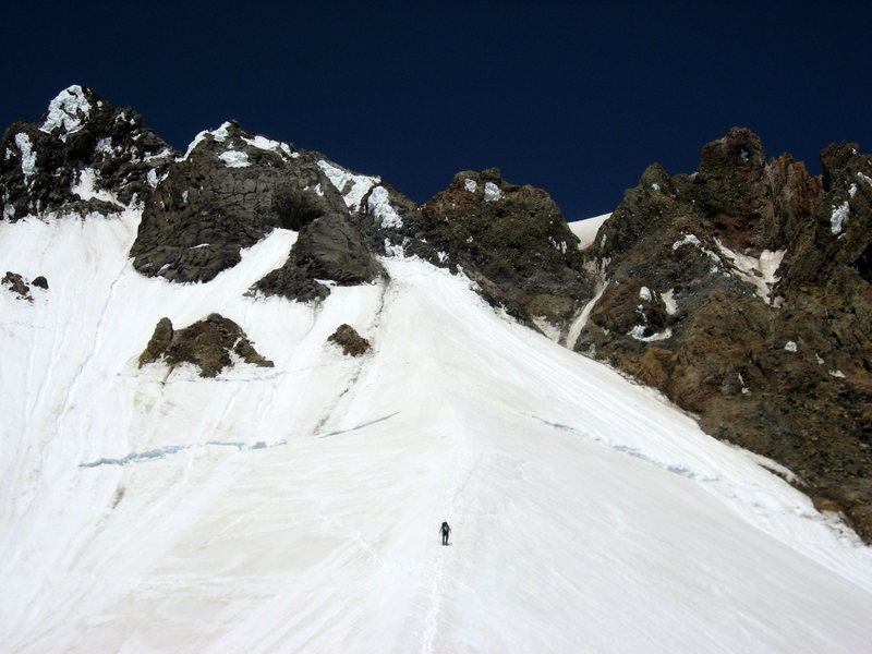 Unknown climber on the hogsback headed toward the icy dribble on the right that used to be the Pearly Gates. 7/6/08