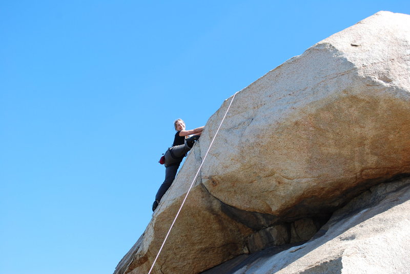 Noelle over the crux of the roof section on the Beach Prob. 2-28-10