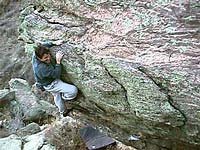 Matt Samet on the Warm-Ups on the Left Illness Boulder. (Photo taken from frontrangebouldering.com.)