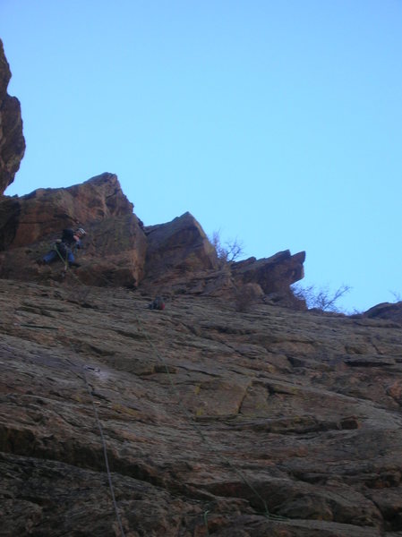 Simplified cluster, drillin on lead, ground up. The route is Playin Hooky 5.8 on creekside