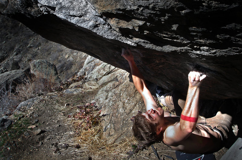 Jason Baker standing up to the explosive power of "Rhino (v10)."<br>
<br>
Photo by: Luke Childers