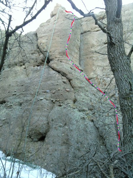 Up the outside corner, staying mostly on the left of the arete. The Honey Crack is obvious to the left of this climb.