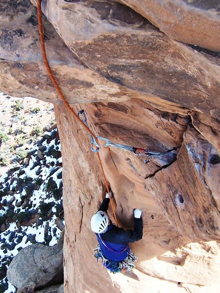 Dean is following the crux summit pitch on Otto's route. Note the massive drilled holes for the pipes.