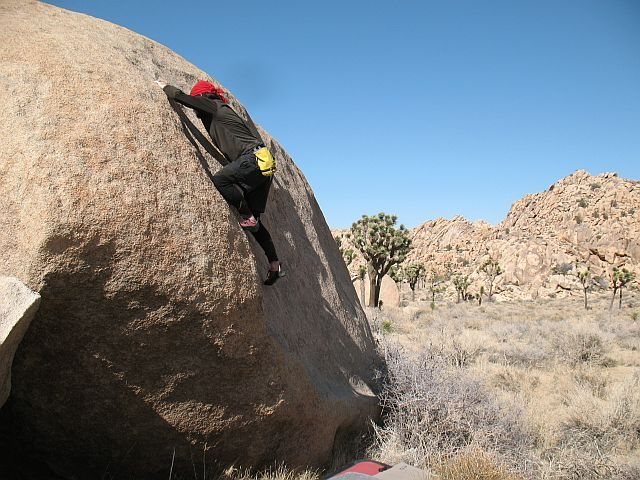 Craig at the crux of Use What I Got (V2), Joshua Tree NP<br>