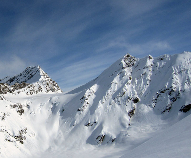 This is a ski run in the Chugach called "Hot Tubs & Beers". It goes down the shadowed ramp down and left from the peak in the center of the photo. 45 degrees for 2500 vertical.