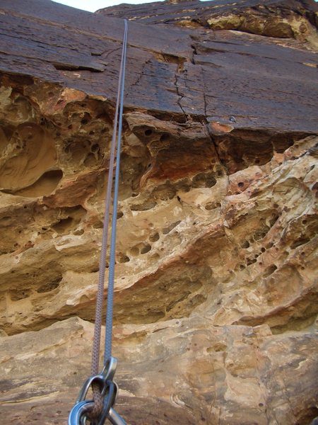 Y2K, Pitch 1, 5.10a roof. (Bolt on right)