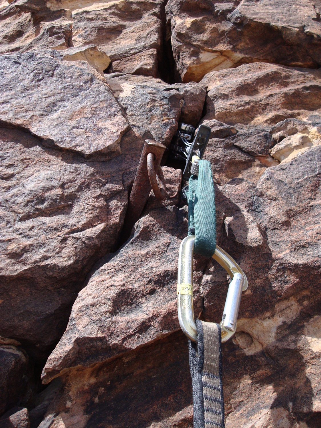 Perfect cam placement by one of the museumpiece pitons.