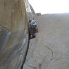 Agina getting a little Trad lead practice on The Jam Crack (Smooth Sole Wall).  4-18-10