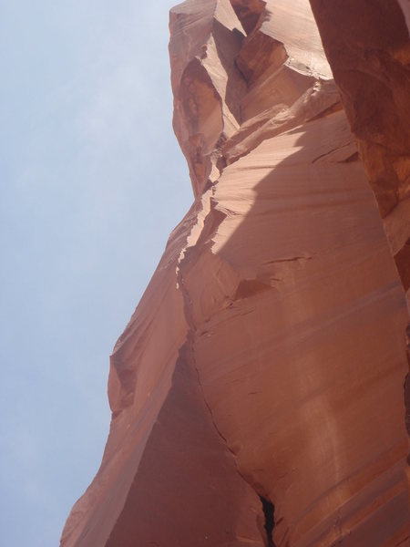 The crux is at the thinnest part of the corner where the wall bulges out.