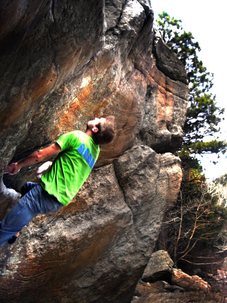 Tom pushing for the mega toss and stick on "Zion (V8?)."<br>
<br>
Photo by: Luke Childers.