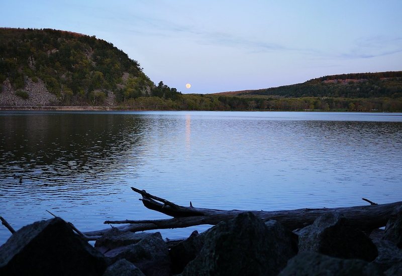 Full moon rising in the east as the sun sets in the west. Perfect cap to a great evening.