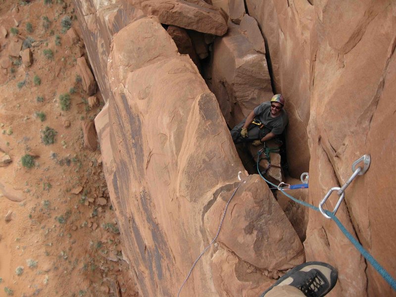View of the last belay from halfway up the last pitch.