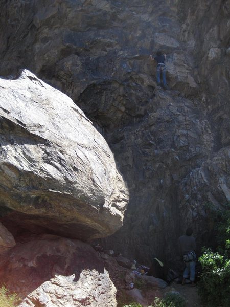 Start of Fantasia with brown painted hangers to the right of the large boulder