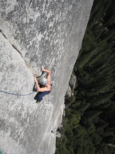 Tom inspects the crack for signs of serenity as he nears the end of pitch 2. <br>
<br>
March 2010
