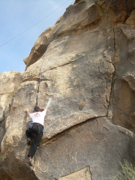 Kelby Burnham on My Naughty Little Donkey at The Monkey's Paw. The crack to his right is the bottom section of Meth Mart.