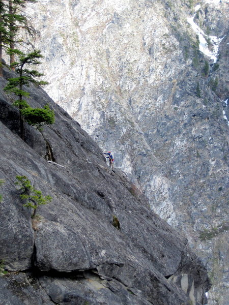 Topping out on the last pitch of Orbit, as seen from the descent gully