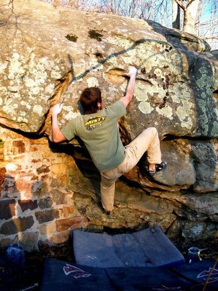 Adam Walker on "Out House" (V-5+) at the roadside boulder, bluefield boulders.