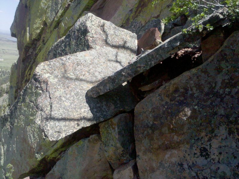 The "Death Blocks" at the Top of the P3 Belay. They are easy to go around but rather precarious looking.