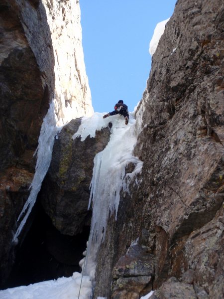 Ryan M. enjoying good ice on the first chockstone. Late May, 2010.