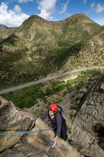 Nicole nears the top of Rational Expectations, more than 300 feet above Sespe Creek, in the Central Gully of the Fortress.