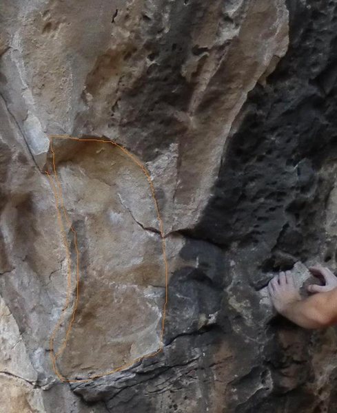 Orange outline shows where the rock has broken off. Rock contained key holds to routes 1-3 in beta photo 1-Fading 2-Red to Blue 3- BMW. <br>
You can compare the rock to the action photo in One-Leg wonder.(One-Leg wonder looks intact)
