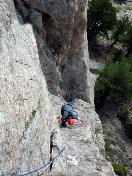 For the follower, the "easy face climbing" is more of an option. It is mostly bear-hugging the arete and inside edge, stepping into typical Lumpy Ridge scoops. Really makes the leader resent the 2nd.