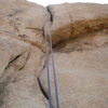 Picture of the easily by-passed overhang section of The Bong (picture taken on rappel, May 2010).  