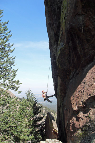 Brenda makes a long, beautiful rappel off the Matron in Sept 2009.