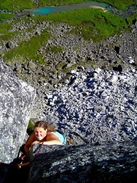 The pain doesn't entirely stop Shasta as she grimaces through an offwidth variation near pitch four of Toto (named Beastiality I believe?) in Archangel Valley, Alaska.