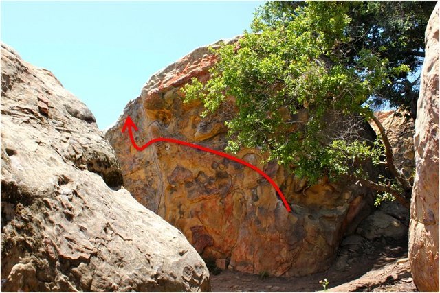 Beta photo for the Under Rover traverse. This problem starts on jugs near the left side of the hole (starting holds for Way Under) and follows the best holds left and tops out on good crimps just left of the corner on Rover.