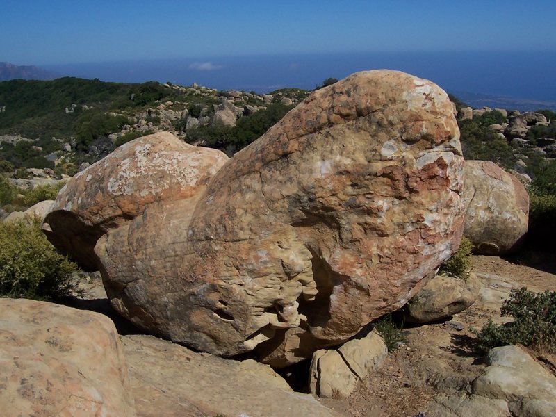 Johnny Bigmouth boulder. Emergency Response takes the path of least resistance out the overhang on the left side of the photo.